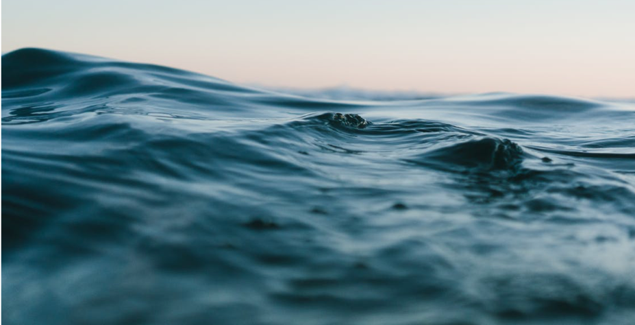 ody of Water Under Blue and White Skies