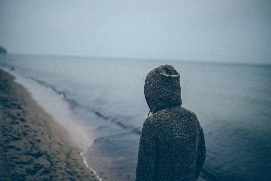 3 Practical Pain Management Solutions for Fibromyalgia, man walking cloudy day