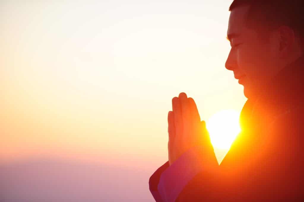 Meditation for beginners, meditating by the sunrise or sunset